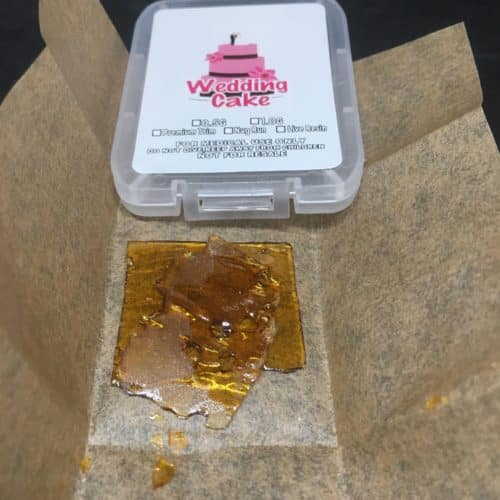 wedding cake shatter scaled - Wedding Cake Premium Shatter Indica Leaning Hybrid Weed Delivery Toronto - Cannabis Delivery Toronto - Marijuana Delivery Toronto - Weed Edibles Delivery Toronto - Kush Delivery Toronto - Same Day Weed Delivery in Toronto - 24/7 Weed Delivery Toronto - Hash Delivery Toronto - We are Kind Flowers - Premium Cannabis Delivery in Toronto with over 200 menu items. We’re an experienced weed delivery in Toronto and we deliver all orders in a smell-proof, discreet package straight to your door. Proudly Canadian and happy to always serve you. We offer same day weed delivery toronto, cannabis delivery toronto, kush delivery toronto, edibles weed delivery toronto, hash delivery toronto, 24/7 weed delivery toronto, weed online delivery toronto