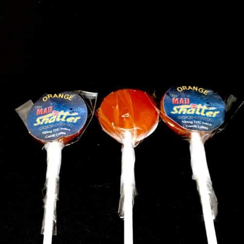 orange 3 lollies mad shatter scaled - The Mad Shatter Orange Lollies 100mg THC Indica